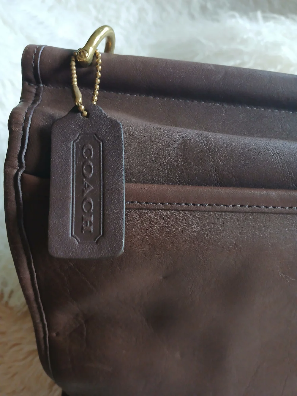 Classic Brown Leather Messenger Bag with Gold Hardware Coach.
